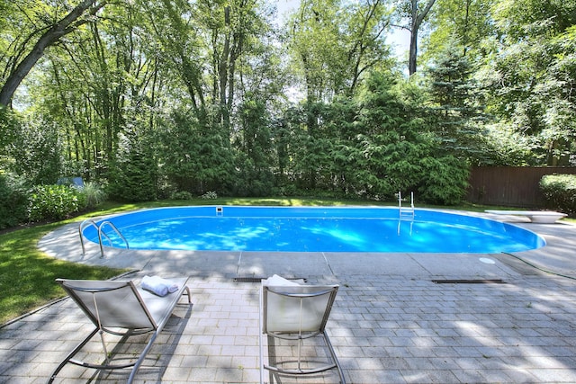 52 Woodside Ave, Westport, CT 06880 - view of swimming pool featuring a patio area and a diving board