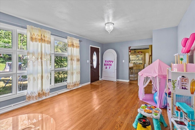 146 Whitewood Rd, Torrington, CT 06790 - foyer with wood finished floors and baseboards