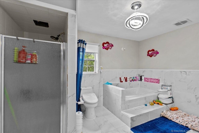 146 Whitewood Rd, Torrington, CT 06790 - full bath featuring marble finish floors, a bath, a shower stall, toilet, and tile walls