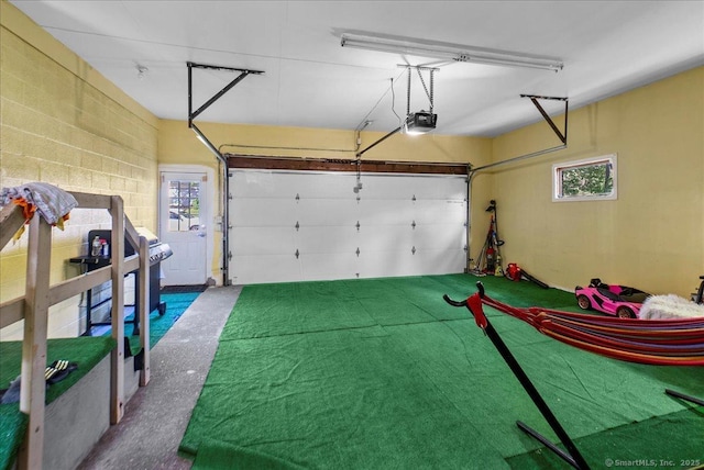 146 Whitewood Rd, Torrington, CT 06790 - garage featuring a garage door opener