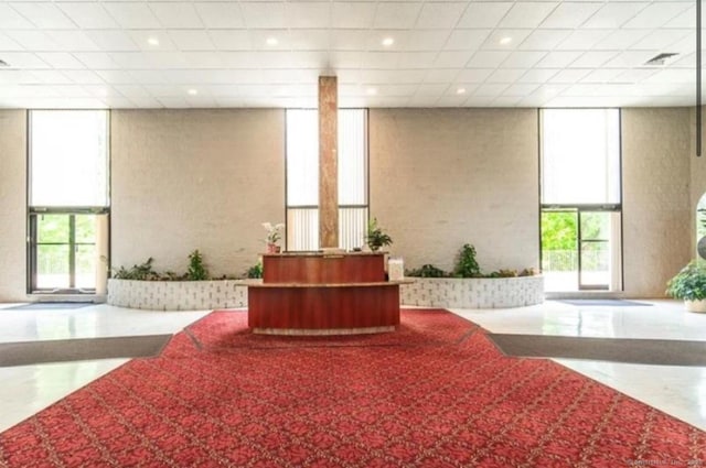 3200 Park Ave Unit 10A1, Bridgeport, CT 06604 - reception featuring a wall of windows and recessed lighting