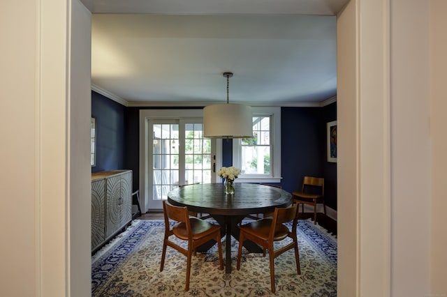 102 Rose Ln, Darien, CT 06820 - dining space with wood finished floors, baseboards, and ornamental molding