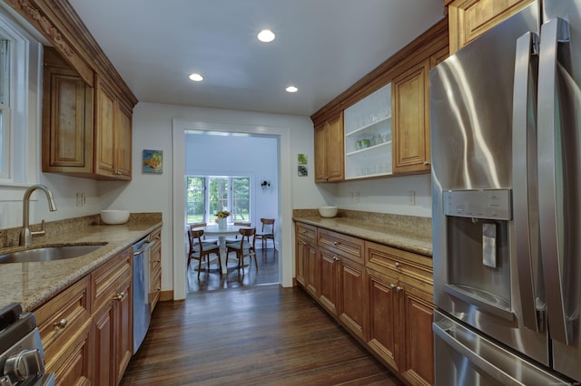 102 Rose Ln, Darien, CT 06820 - kitchen with stainless steel appliances, a sink, dark wood finished floors, recessed lighting, and light stone countertops