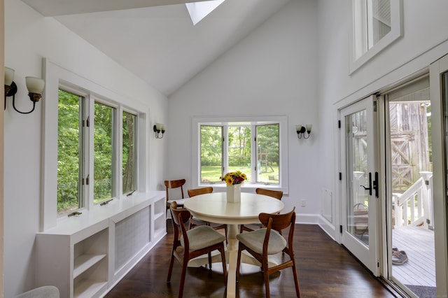 102 Rose Ln, Darien, CT 06820 - dining area featuring high vaulted ceiling, dark wood finished floors, a skylight, and baseboards