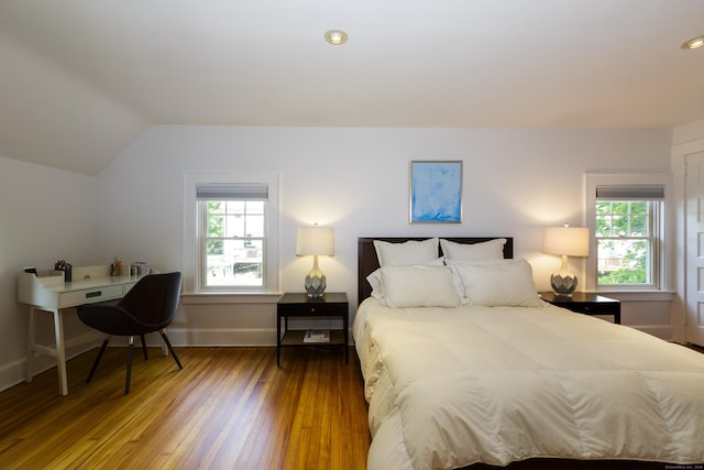 102 Rose Ln, Darien, CT 06820 - bedroom with wood finished floors, vaulted ceiling, baseboards, an office area, and recessed lighting