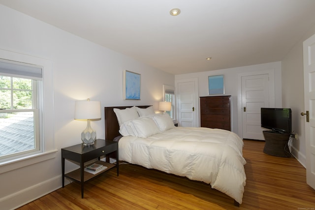 102 Rose Ln, Darien, CT 06820 - bedroom featuring wood finished floors, baseboards, and recessed lighting