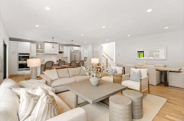 10 Singing Woods Rd, Norwalk, CT 06850 - living area featuring stairs, recessed lighting, and light wood-style flooring