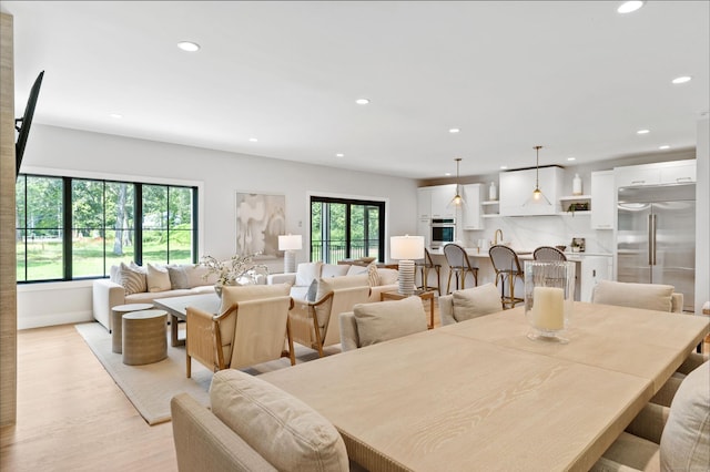 10 Singing Woods Rd, Norwalk, CT 06850 - dining area featuring light wood finished floors and recessed lighting