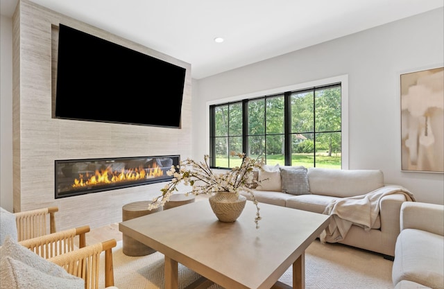 10 Singing Woods Rd, Norwalk, CT 06850 - living room featuring a tile fireplace and recessed lighting