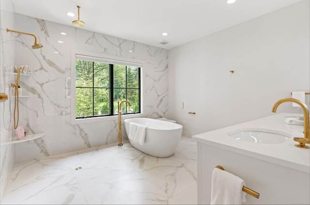 10 Singing Woods Rd, Norwalk, CT 06850 - full bath featuring marble tiled floors, a freestanding bath, recessed lighting, double vanity, and a marble finish shower