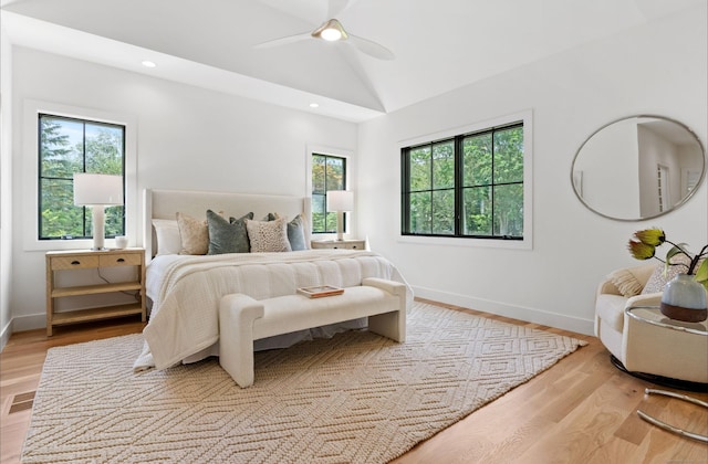 10 Singing Woods Rd, Norwalk, CT 06850 - bedroom featuring multiple windows, wood finished floors, recessed lighting, a ceiling fan, and lofted ceiling