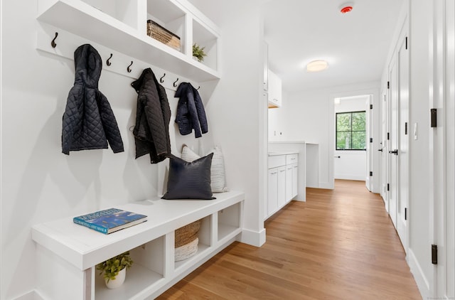 10 Singing Woods Rd, Norwalk, CT 06850 - mudroom featuring light wood-style flooring and baseboards