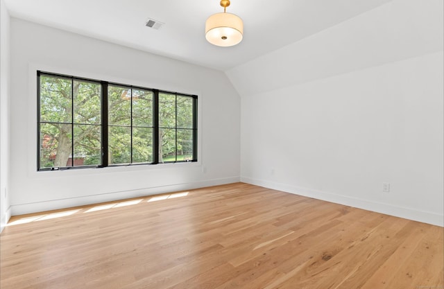 10 Singing Woods Rd, Norwalk, CT 06850 - empty room with vaulted ceiling and light wood finished floors