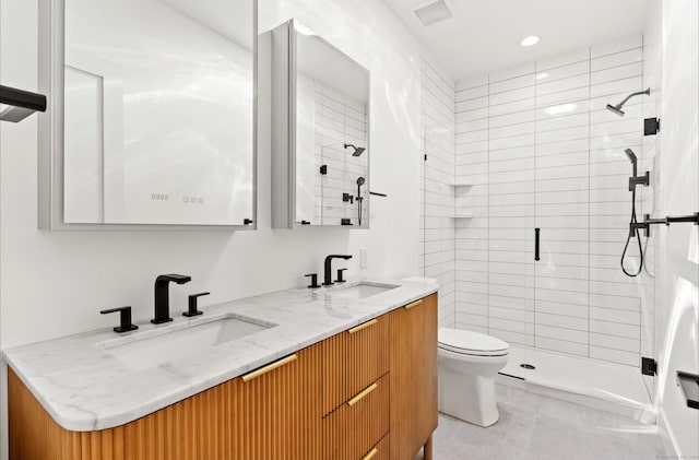 10 Singing Woods Rd, Norwalk, CT 06850 - full bathroom with a shower stall, double vanity, recessed lighting, and tile patterned floors