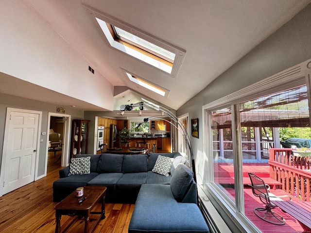 10 Laurel Trl, Durham, CT 06422 - living room with a skylight, hardwood / wood-style flooring, and high vaulted ceiling