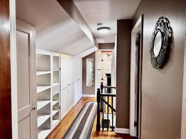 10 Laurel Trl, Durham, CT 06422 - hall featuring light wood-style flooring, baseboards, vaulted ceiling, and an upstairs landing