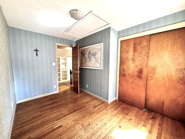 10 Laurel Trl, Durham, CT 06422 - unfurnished bedroom featuring attic access, wood finished floors, baseboards, and a closet