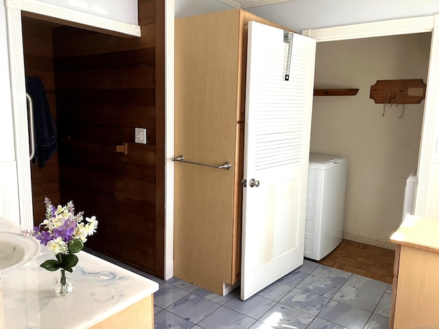 10 Laurel Trl, Durham, CT 06422 - bathroom with washer / dryer, vanity, and baseboards