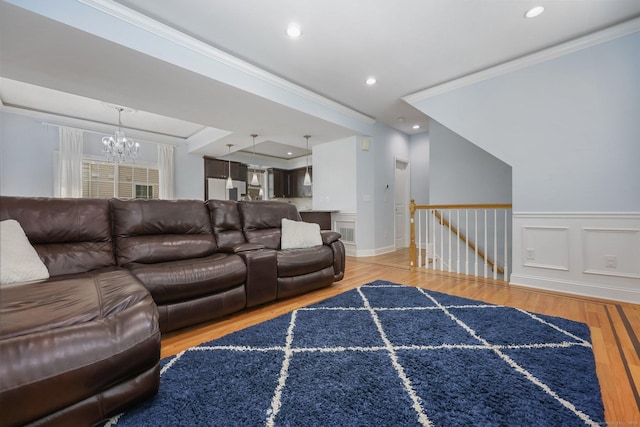 40 Ferris Ave Apt 6, Norwalk, CT 06854 - living room with wood finished floors, a chandelier, crown molding, recessed lighting, and a wainscoted wall