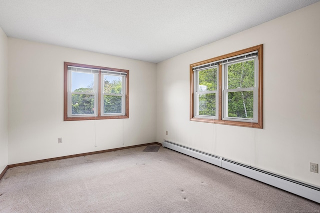 1441 Woodtick Rd, Wolcott, CT 06716 - carpeted spare room with a baseboard heating unit, plenty of natural light, and baseboards