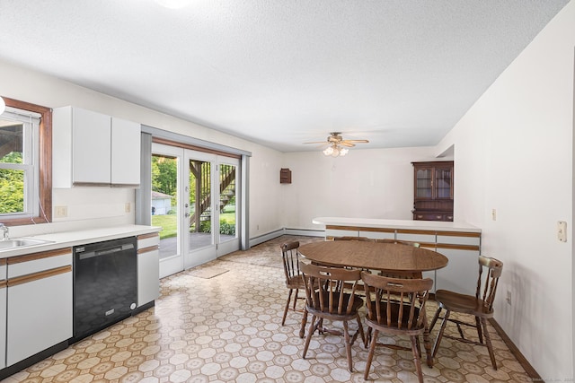 1441 Woodtick Rd, Wolcott, CT 06716 - dining space with a ceiling fan, a textured ceiling, and baseboards