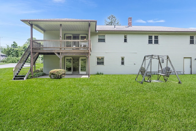 1441 Woodtick Rd, Wolcott, CT 06716 - back of house featuring a lawn, stairs, and a chimney