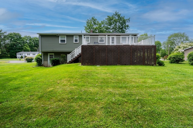 39 Ivy Dr, Southington, CT 06489 - rear view of property featuring a lawn, stairway, and a deck