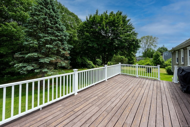 39 Ivy Dr, Southington, CT 06489 - wooden deck featuring a lawn