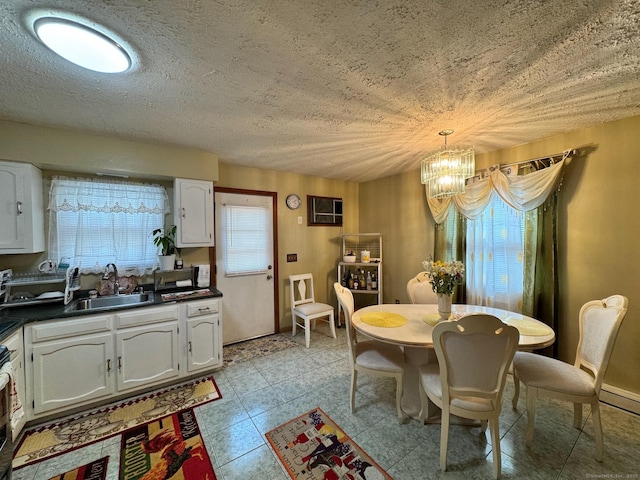 82 Louisiana Ave, Bridgeport, CT 06610 - dining space with a chandelier and a textured ceiling