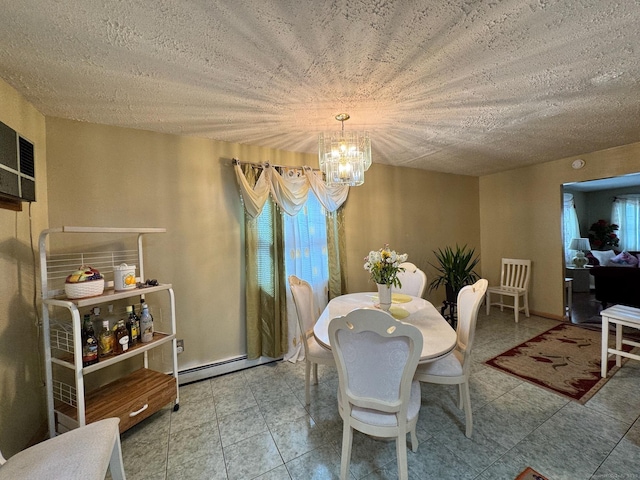 82 Louisiana Ave, Bridgeport, CT 06610 - dining room featuring a chandelier, a baseboard radiator, and a textured ceiling
