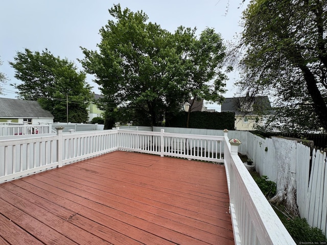 82 Louisiana Ave, Bridgeport, CT 06610 - wooden terrace with a fenced backyard