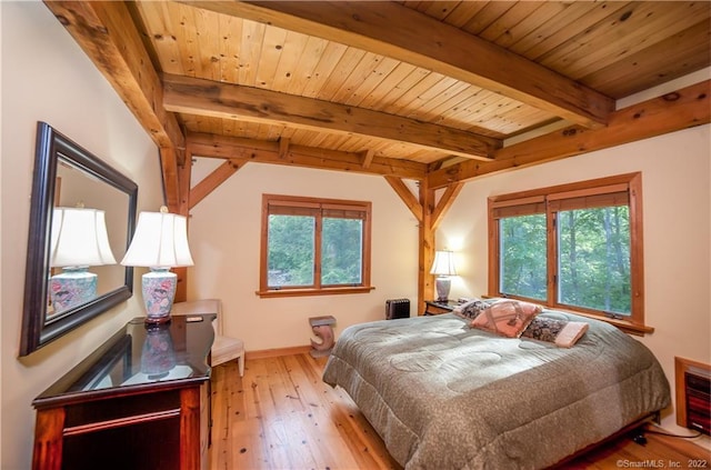 9A Obtuse Rocks Rd, Brookfield, CT 06804 - bedroom featuring multiple windows, wood-type flooring, radiator, and a wooden ceiling with exposed beams