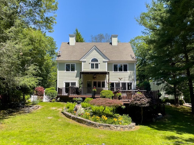 9A Obtuse Rocks Rd, Brookfield, CT 06804 - rear view of property featuring a lawn, a deck, a chimney, and a ceiling fan