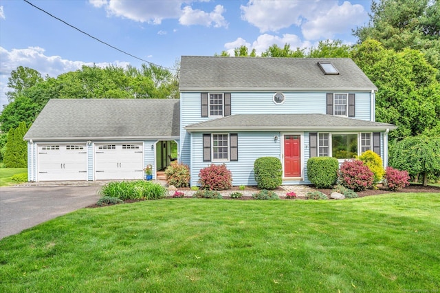 146 Shunpike Rd, Cromwell, CT 06416 - view of front of house featuring an attached garage, driveway, a front yard, and roof with shingles