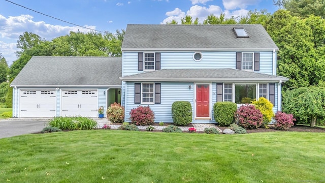 146 Shunpike Rd, Cromwell, CT 06416 - view of front of home featuring a garage, a front lawn, and asphalt driveway