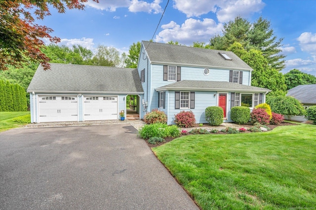 146 Shunpike Rd, Cromwell, CT 06416 - view of front of home with a garage, a front lawn, driveway, and a shingled roof
