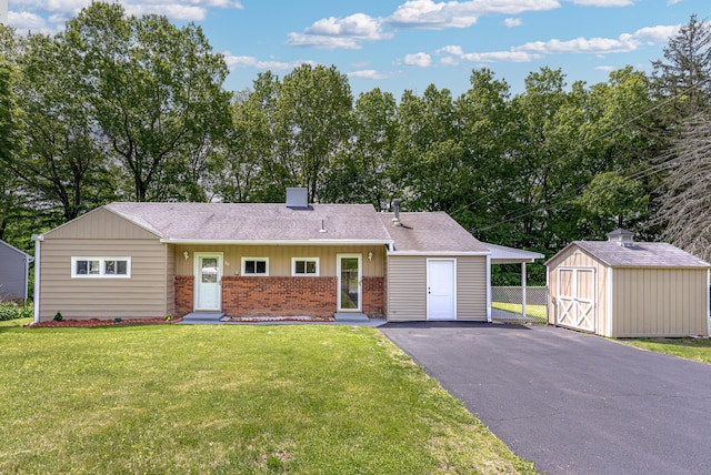 30 Bilby Dr, Wolcott, CT 06716 - ranch-style house featuring brick siding, driveway, a front lawn, a chimney, and a shingled roof