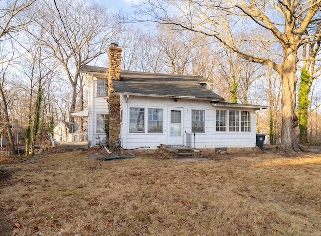 25 Gray Ledge Rd, Branford, CT 06405 - view of front of property featuring a chimney, roof with shingles, and a front yard
