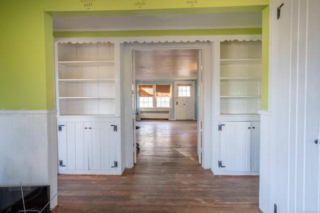 25 Gray Ledge Rd, Branford, CT 06405 - hall featuring radiator heating unit, built in features, dark wood-style flooring, and wainscoting