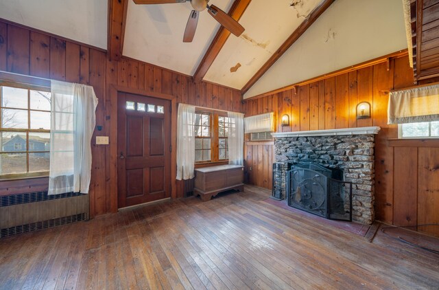 25 Gray Ledge Rd, Branford, CT 06405 - foyer featuring radiator, hardwood / wood-style floors, wood walls, ceiling fan, and beam ceiling