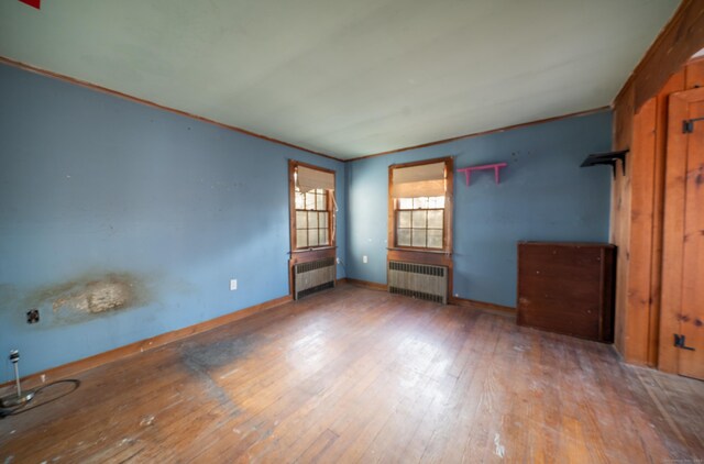 25 Gray Ledge Rd, Branford, CT 06405 - unfurnished bedroom featuring radiator heating unit, wood-type flooring, and baseboards