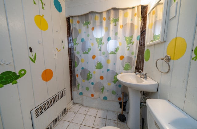 25 Gray Ledge Rd, Branford, CT 06405 - full bathroom with toilet, radiator, tile patterned flooring, and shower / tub combo