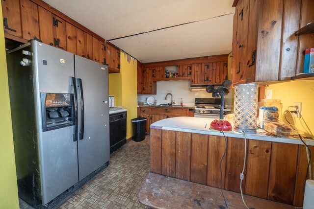 25 Gray Ledge Rd, Branford, CT 06405 - kitchen featuring fridge with ice dispenser, gas range, brown cabinetry, and a sink