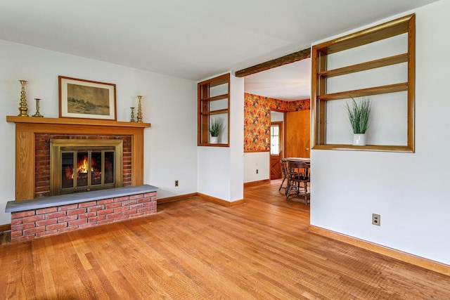 475 Hoyt St, Darien, CT 06820 - unfurnished living room featuring wood finished floors, a fireplace, and baseboards