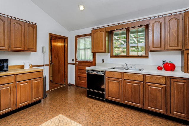 475 Hoyt St, Darien, CT 06820 - kitchen featuring black appliances, a sink, light countertops, lofted ceiling, and brown cabinetry