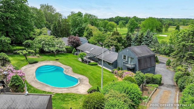 475 Hoyt St, Darien, CT 06820 - swimming pool with a lawn and view of scattered trees
