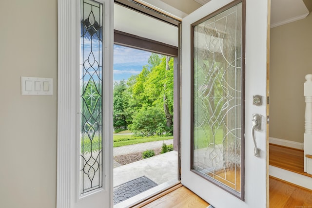 40 Spring Hill Ln, Bethel, CT 06801 - foyer featuring ornamental molding, wood finished floors, and baseboards