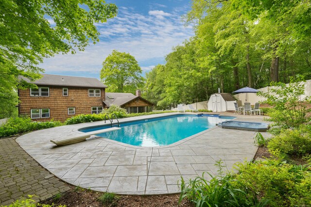 40 Spring Hill Ln, Bethel, CT 06801 - view of pool featuring a patio area, a diving board, and outdoor dining area
