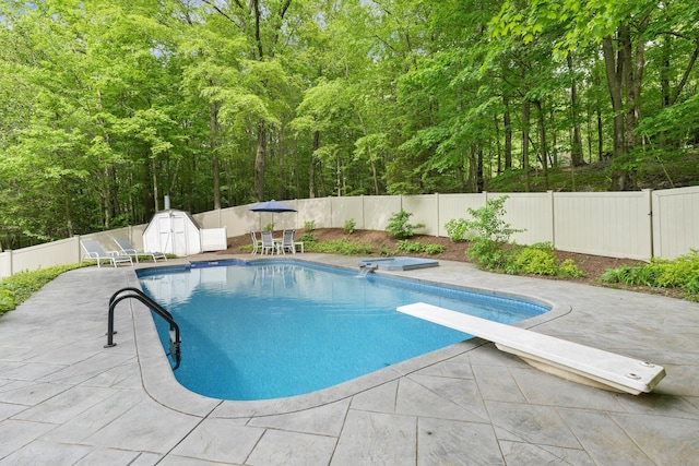 40 Spring Hill Ln, Bethel, CT 06801 - view of pool featuring a patio area, a diving board, and a fenced backyard