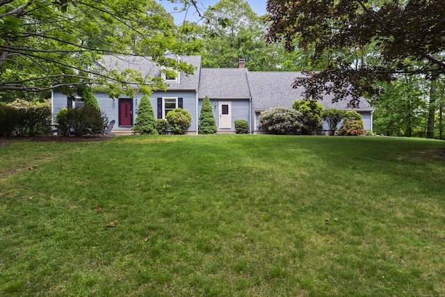 114 Dean Rd, East Lyme, CT 06333 - cape cod house with a shingled roof, a front lawn, and a chimney